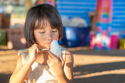 Close-up of girl looking at camera