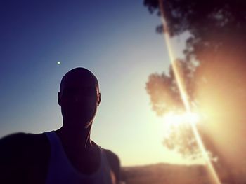 Portrait of silhouette man against sky during sunset