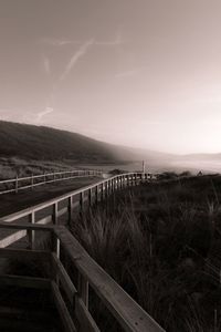 Scenic view of bridge over sea against sky