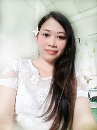 Portrait of a smiling young woman