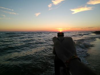 Scenic view of sea at sunset