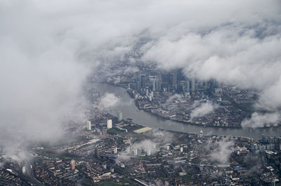 High angle view of buildings in city against sky