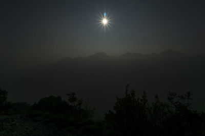 Scenic view of silhouette mountains against sky