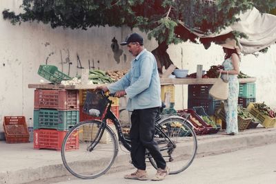 Full length of woman standing on railroad platform