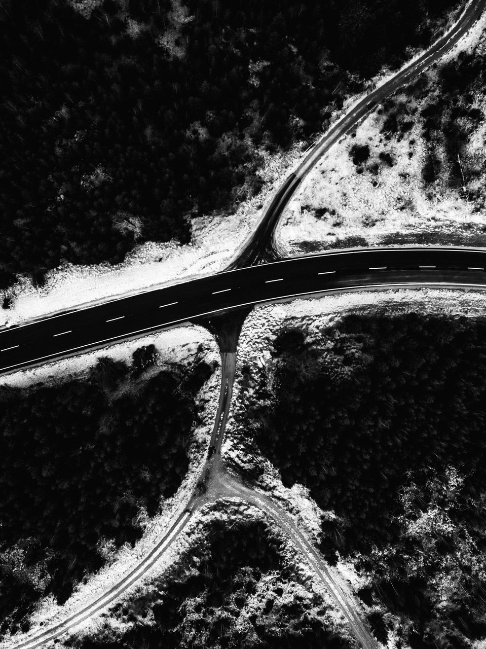 CLOSE-UP OF CAR ON ROAD