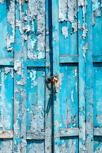 Full frame shot of blue weathered door