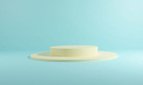 Close-up of tea light against blue background