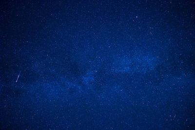 Low angle view of stars in sky at night