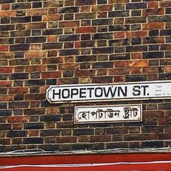 Information sign on brick wall