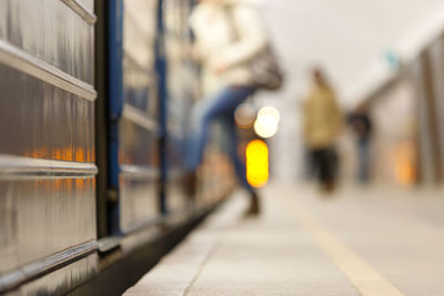 Blurred motion of train at railroad station