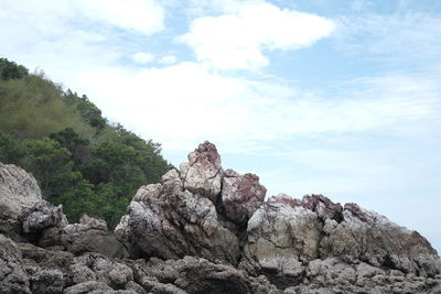 Low angle view of rocks against sky