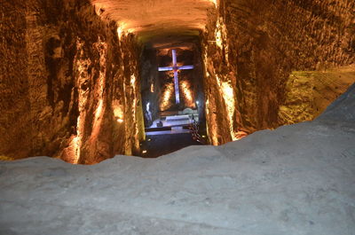 Road in illuminated tunnel