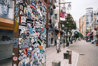 Graffiti on wall by street in city