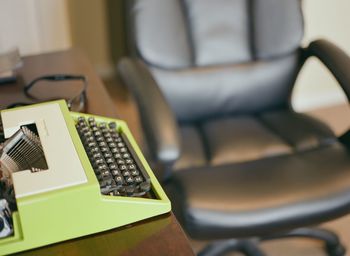 High angle view of typewriter on desk at office