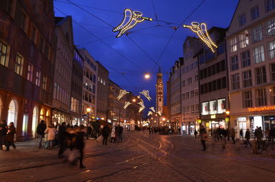 People on street at night