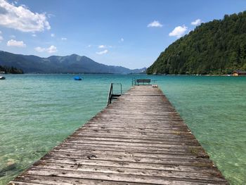 Pier over sea against sky