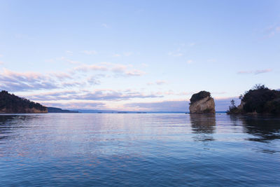 Scenic view of swimming pool by sea against sky