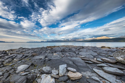 Scenic view of sea against cloudy sky