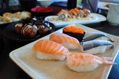 Close-up of sushi served on table