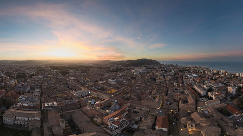 High angle view of townscape against sky during sunset