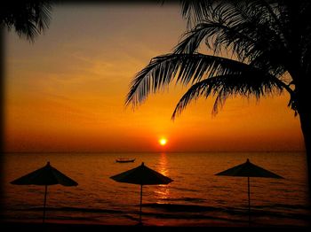 Scenic view of sea at sunset