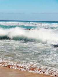 Waves splashing on rocks