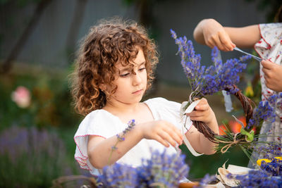 Young woman holding bouquet