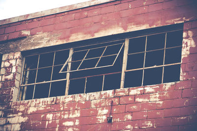 Low angle view of brick wall