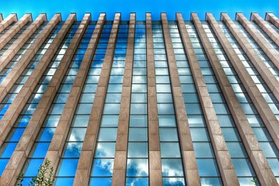 Low angle view of building against blue sky