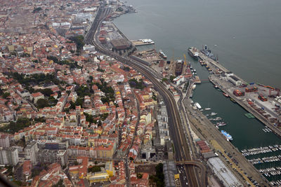 High angle view of crowd on road by buildings