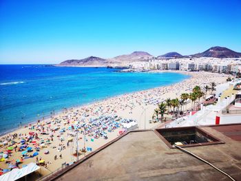 Scenic view of sea against blue sky