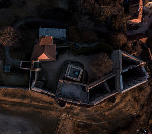 High angle view of old building by street at night