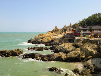 Scenic view of sea against clear blue sky