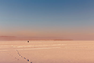 Scenic view of desert against clear sky