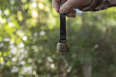 Close-up of hand holding water