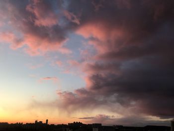 Low angle view of dramatic sky during sunset