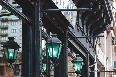 Low angle view of old street lamps