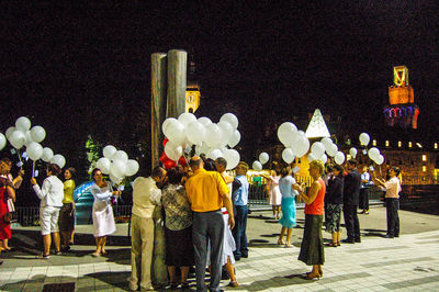 Statue of people at night