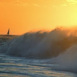 Scenic view of sea against sky during sunset