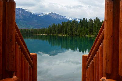 Scenic view of calm lake and mountains