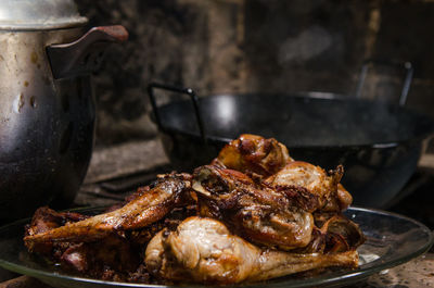 Close-up of meat on barbecue grill