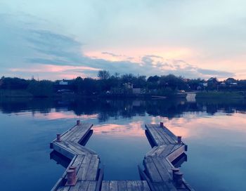 Scenic view of lake against sky during sunset