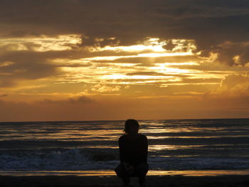 Scenic view of sea at sunset