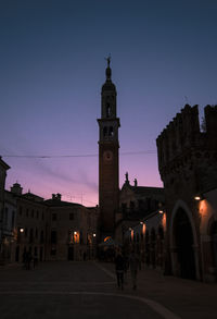 View of illuminated buildings in city