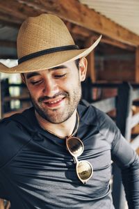 Portrait of smiling man wearing hat