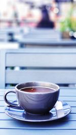Close-up of coffee cup on table