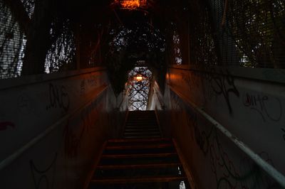 Low angle view of illuminated staircase at night