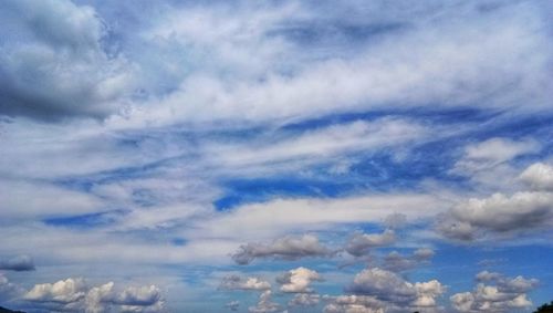 Low angle view of clouds in blue sky