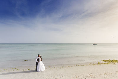 Photo session carried out after the wedding to a couple on the beach