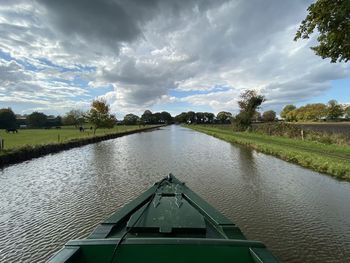 Scenic view of canal against sky